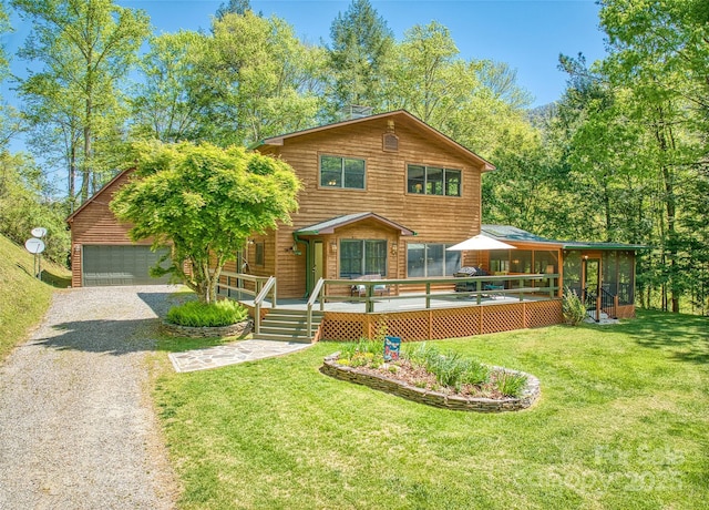 1192 Rockdale Rd, Whittier, NC 28789 - rustic home featuring a sunroom, a garage, a front lawn, and a wooden deck