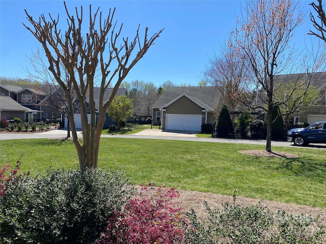 view of yard featuring an attached garage
