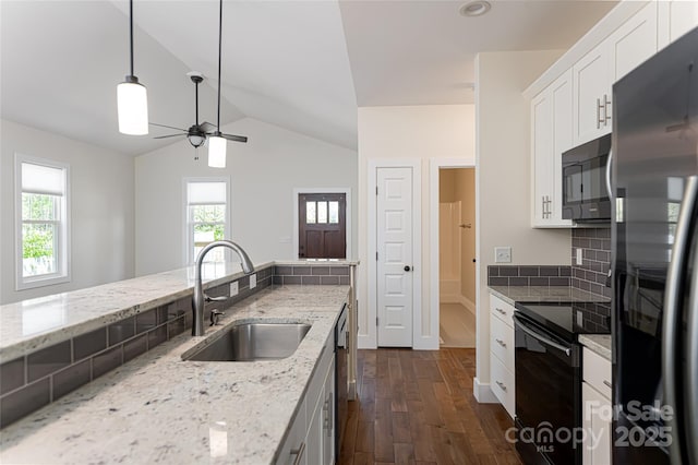 220 Mount Allen Heights, Black Mountain, NC 28711 - kitchen with fridge with ice dispenser, black range with electric cooktop, ceiling fan, vaulted ceiling, and dark wood-style floors
