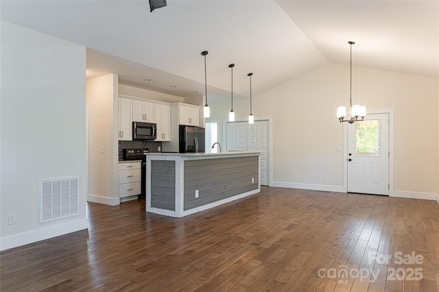 220 Mount Allen Heights, Black Mountain, NC 28711 - kitchen featuring refrigerator with ice dispenser, white cabinetry, a chandelier, dark wood finished floors, and a center island with sink