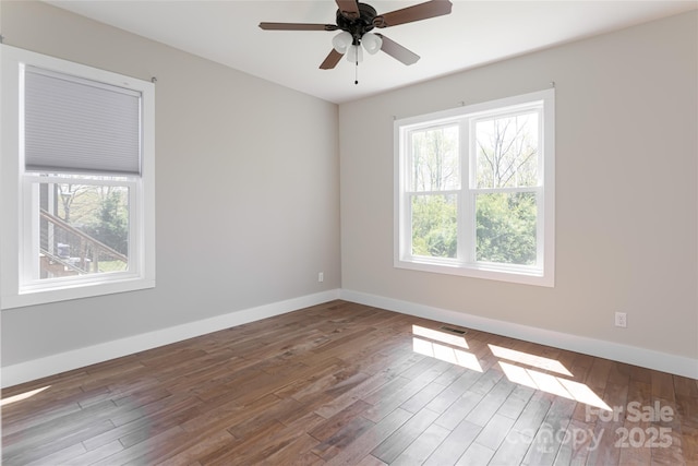 220 Mount Allen Heights, Black Mountain, NC 28711 - empty room featuring plenty of natural light and wood finished floors