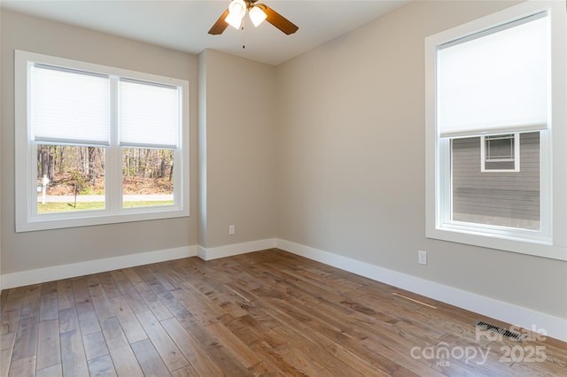 220 Mount Allen Heights, Black Mountain, NC 28711 - empty room featuring hardwood / wood-style flooring and a ceiling fan