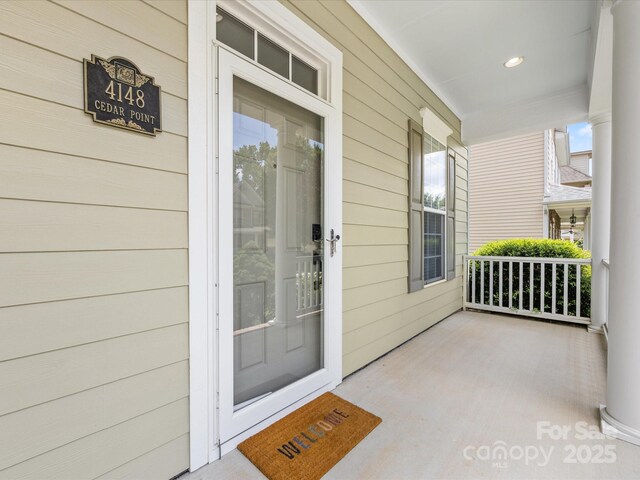 4148 Cedar Point Ave, Matthews, NC 28104 - view of exterior entry featuring covered porch