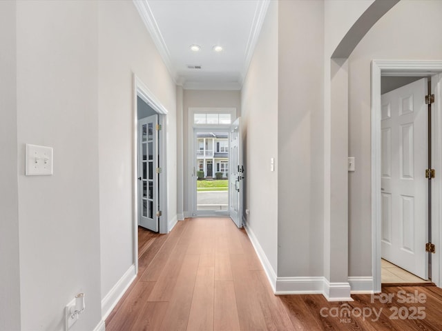 4148 Cedar Point Ave, Matthews, NC 28104 - corridor with ornamental molding, light wood-style floors, recessed lighting, and arched walkways