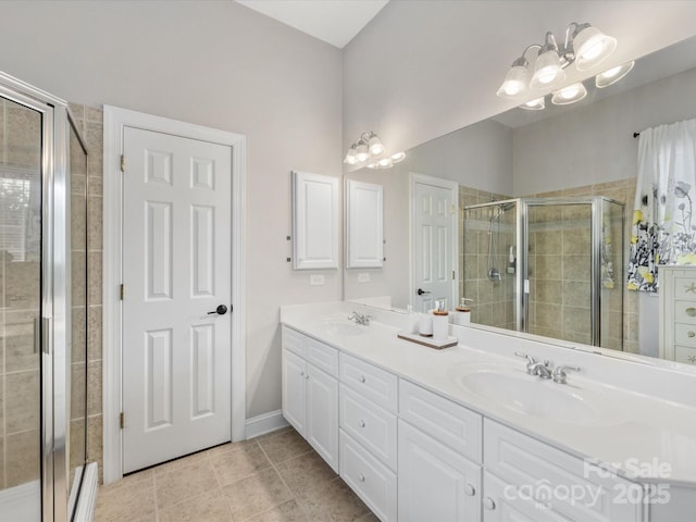 4148 Cedar Point Ave, Matthews, NC 28104 - bathroom featuring double vanity, a stall shower, and tile patterned floors