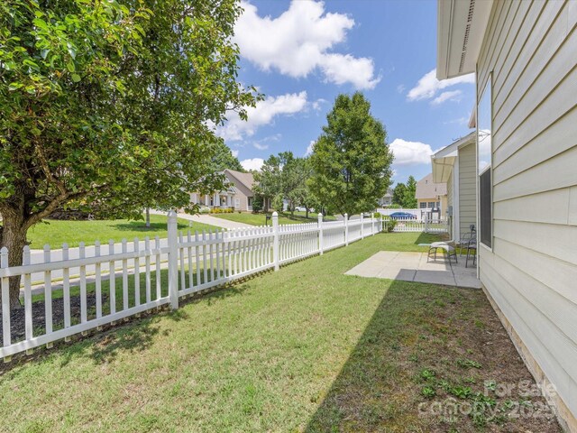 4148 Cedar Point Ave, Matthews, NC 28104 - fenced backyard featuring a patio and a residential view