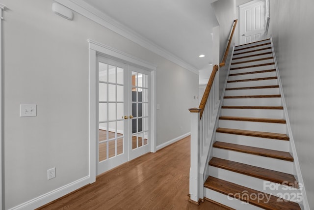 9652 Alma Blount Blvd, Charlotte, NC 28277 - stairs with french doors, baseboards, recessed lighting, wood finished floors, and crown molding