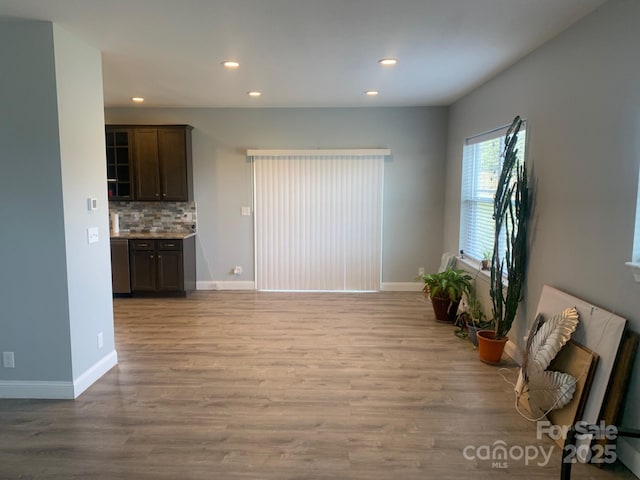 119 Tryon View Dr, Flat Rock, NC 28731 - unfurnished living room featuring recessed lighting, baseboards, and wood finished floors