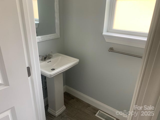 119 Tryon View Dr, Flat Rock, NC 28731 - bathroom with wood finished floors and baseboards