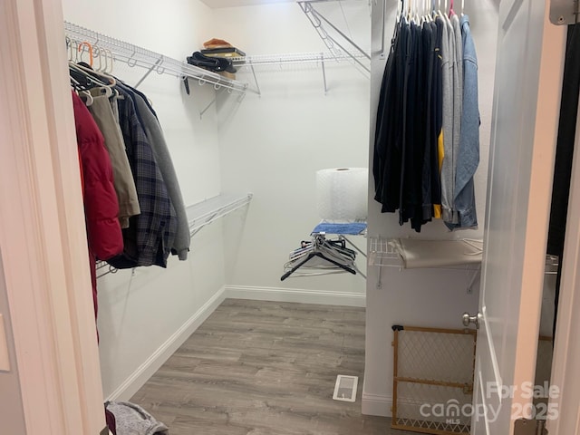 119 Tryon View Dr, Flat Rock, NC 28731 - walk in closet with wood finished floors