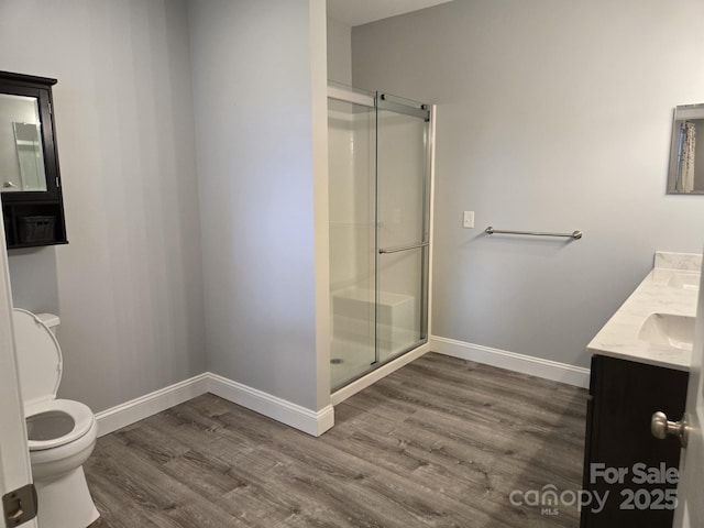 119 Tryon View Dr, Flat Rock, NC 28731 - full bathroom with wood finished floors, vanity, and a shower stall