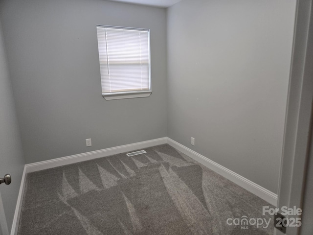119 Tryon View Dr, Flat Rock, NC 28731 - empty room with carpet floors and baseboards