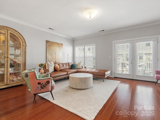 11846 Chelton Ridge Ln, Charlotte, NC 28277 - living room featuring ornamental molding, visible vents, french doors, and wood finished floors
