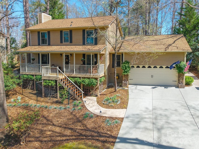 10028 Bora Bora Dr, Tega Cay, SC 29708 - view of front of property with a chimney, an attached garage, roof with shingles, driveway, and covered porch