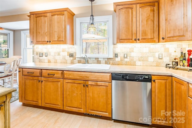 10028 Bora Bora Dr, Tega Cay, SC 29708 - kitchen with dishwasher, light countertops, a sink, and decorative light fixtures