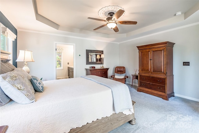 10028 Bora Bora Dr, Tega Cay, SC 29708 - bedroom with light carpet, baseboards, a ceiling fan, and a raised ceiling