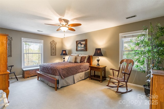 10028 Bora Bora Dr, Tega Cay, SC 29708 - bedroom with a textured ceiling, light colored carpet, and visible vents