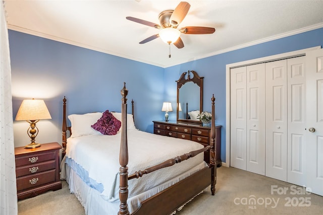 10028 Bora Bora Dr, Tega Cay, SC 29708 - bedroom with a closet, ornamental molding, ceiling fan, and light carpet