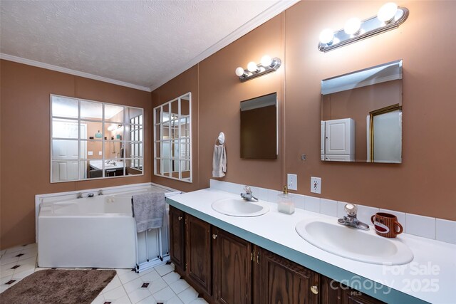 full bathroom with a textured ceiling, double vanity, and a sink