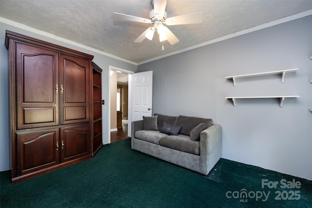 living area with a textured ceiling, ceiling fan, dark colored carpet, and ornamental molding