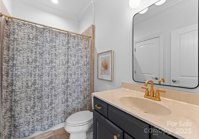 bathroom featuring crown molding, tile patterned flooring, vanity, toilet, and curtained shower