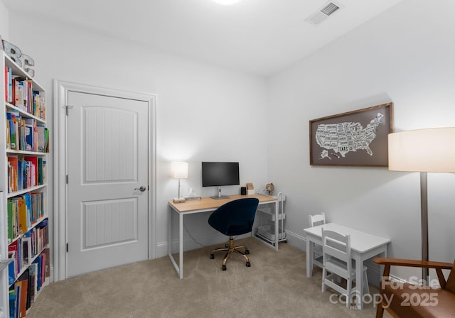 carpeted home office with visible vents