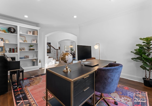 home office with crown molding, arched walkways, dark wood finished floors, baseboards, and recessed lighting