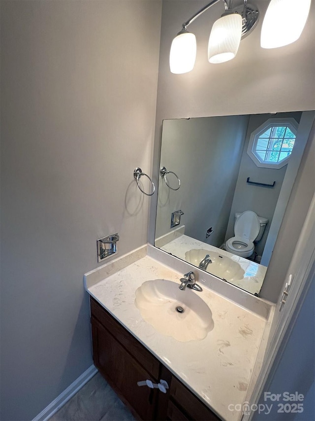 443 Silversmith Ln, Charlotte, NC 28270 - half bath with vanity, toilet, and baseboards