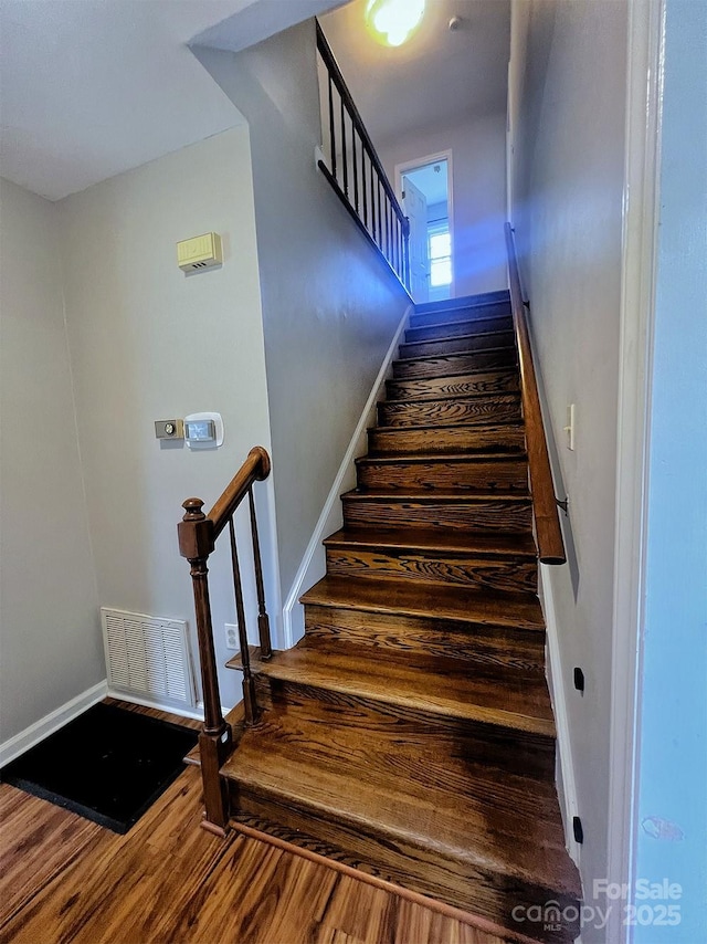 443 Silversmith Ln, Charlotte, NC 28270 - staircase featuring wood finished floors and baseboards