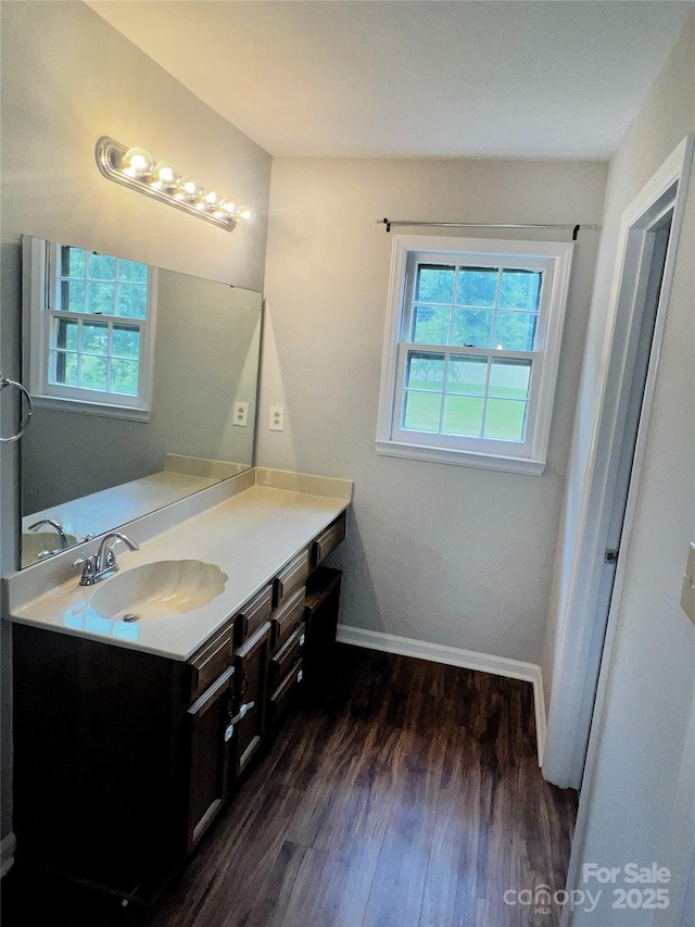 443 Silversmith Ln, Charlotte, NC 28270 - bathroom featuring vanity, wood finished floors, and baseboards