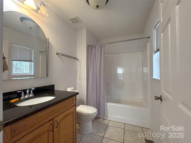 97 Hughes Dr, Maggie Valley, NC 28751 - full bathroom with vanity, tile patterned flooring, toilet, shower / bathtub combination with curtain, and a textured ceiling