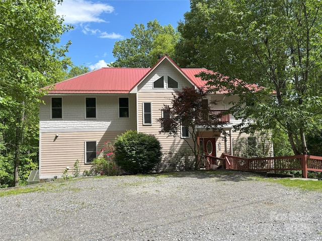 97 Hughes Dr, Maggie Valley, NC 28751 - view of front of house featuring a balcony and metal roof