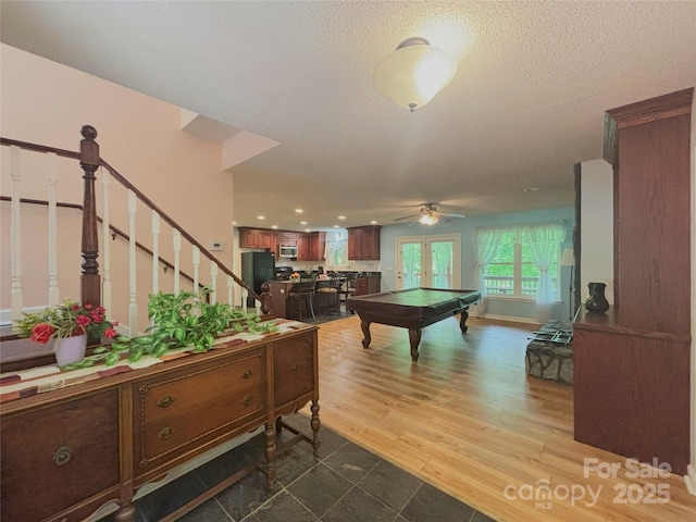 97 Hughes Dr, Maggie Valley, NC 28751 - playroom featuring billiards table, a ceiling fan, wood finished floors, a textured ceiling, and french doors