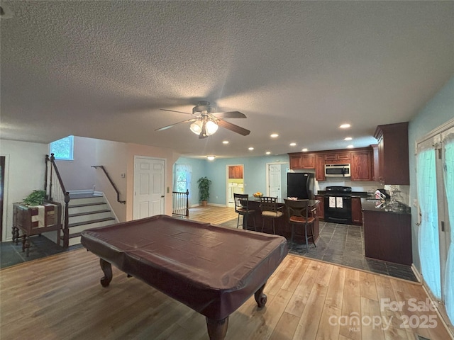 97 Hughes Dr, Maggie Valley, NC 28751 - playroom with wood finished floors, ceiling fan, billiards, recessed lighting, and a textured ceiling