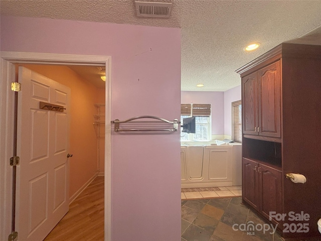 97 Hughes Dr, Maggie Valley, NC 28751 - full bath with a textured ceiling, a bath, and recessed lighting