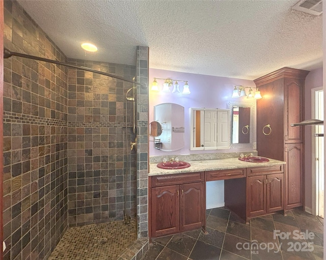 97 Hughes Dr, Maggie Valley, NC 28751 - full bath with a stall shower, double vanity, and a textured ceiling