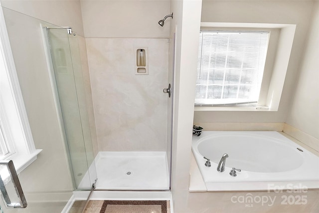 7925 Woodmere Dr, Harrisburg, NC 28075 - bathroom featuring a stall shower and a bath