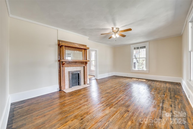 113 Hemphill Ave, Chester, SC 29706 - unfurnished living room featuring ceiling fan, a tile fireplace, ornamental molding, and hardwood / wood-style flooring