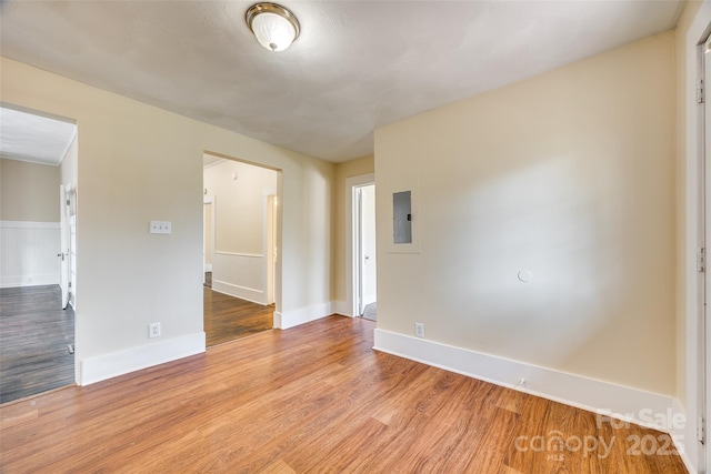 113 Hemphill Ave, Chester, SC 29706 - empty room with electric panel, baseboards, and wood finished floors