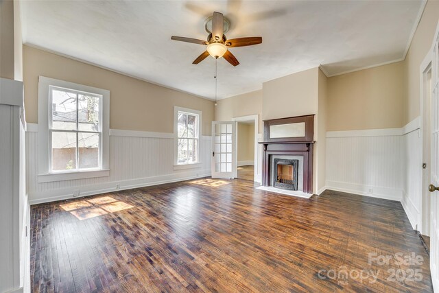 113 Hemphill Ave, Chester, SC 29706 - unfurnished living room with ceiling fan, a high end fireplace, plenty of natural light, and wood-type flooring