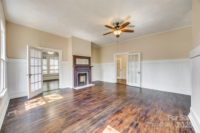 113 Hemphill Ave, Chester, SC 29706 - unfurnished living room with french doors, visible vents, hardwood / wood-style floors, and ceiling fan