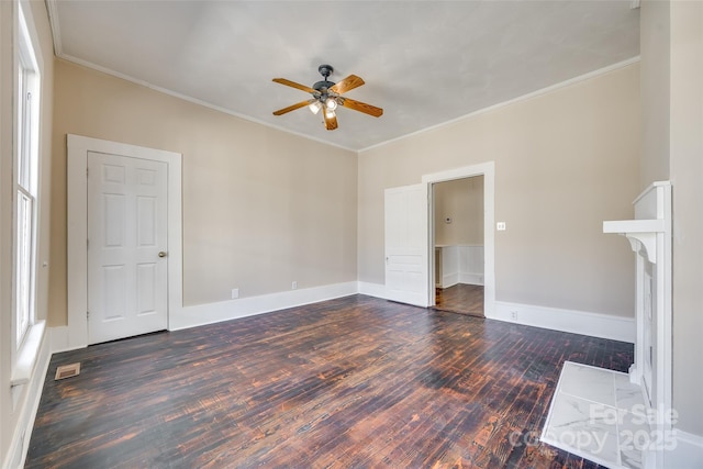 113 Hemphill Ave, Chester, SC 29706 - unfurnished living room with wood finished floors, ornamental molding, baseboards, and ceiling fan