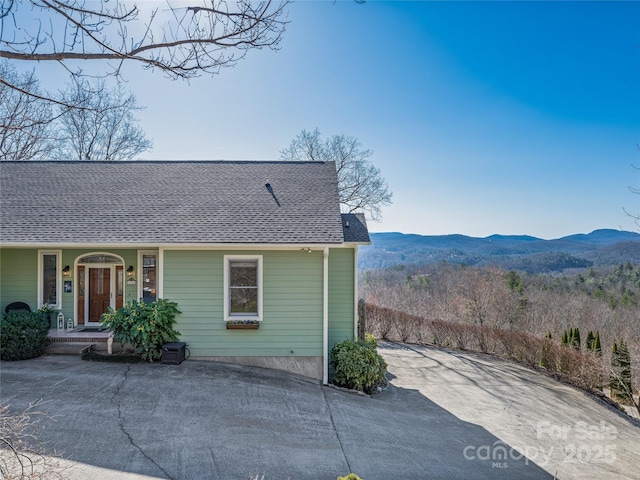 288 Hawks Point Dr, Zirconia, NC 28790 - exterior space with a shingled roof and a mountain view