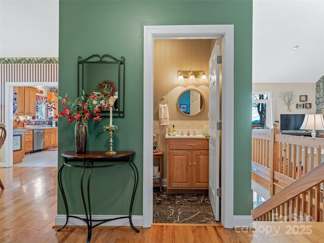 288 Hawks Point Dr, Zirconia, NC 28790 - bathroom with baseboards, wood finished floors, and a sink