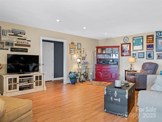 288 Hawks Point Dr, Zirconia, NC 28790 - living room featuring baseboards, wood finished floors, and recessed lighting