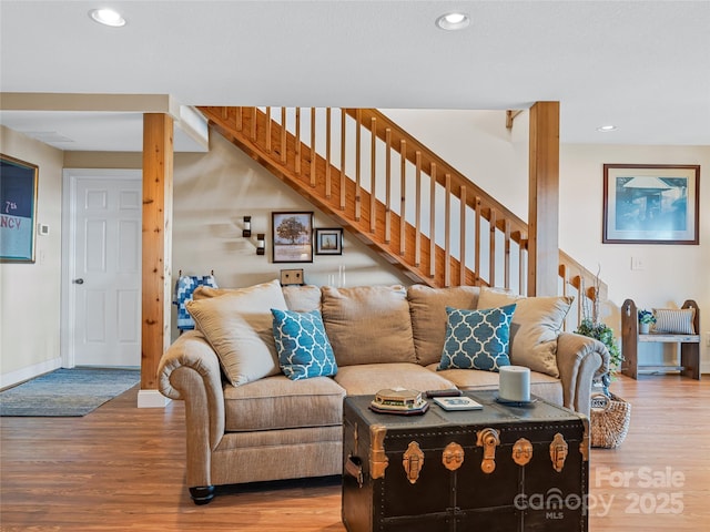 288 Hawks Point Dr, Zirconia, NC 28790 - living area featuring baseboards, stairway, wood finished floors, and recessed lighting