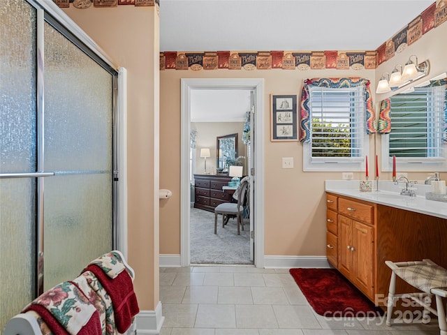 288 Hawks Point Dr, Zirconia, NC 28790 - full bathroom featuring a stall shower, baseboards, tile patterned flooring, and vanity