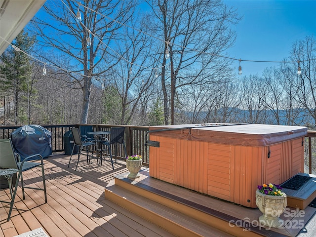288 Hawks Point Dr, Zirconia, NC 28790 - deck with area for grilling, a hot tub, and outdoor dining space