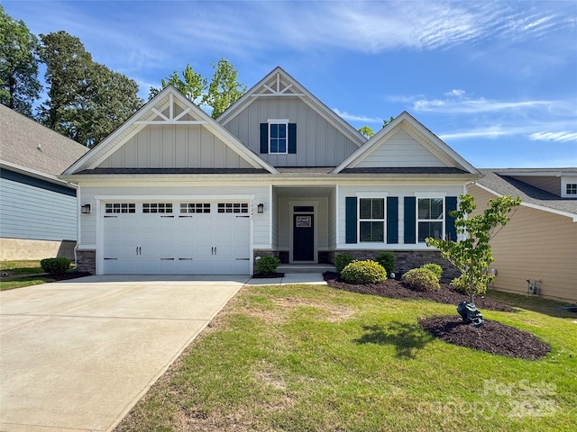 10241 Black Locust Ln, Charlotte, NC 28215 - craftsman-style house featuring board and batten siding, stone siding, a front yard, and concrete driveway