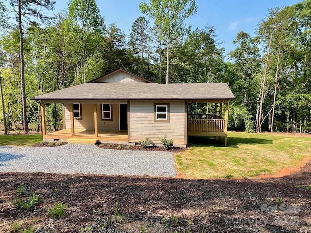 371 Amber Oaks Dr, Rutherfordton, NC 28139 - view of front facade with a porch, a front lawn, a shingled roof, and crawl space